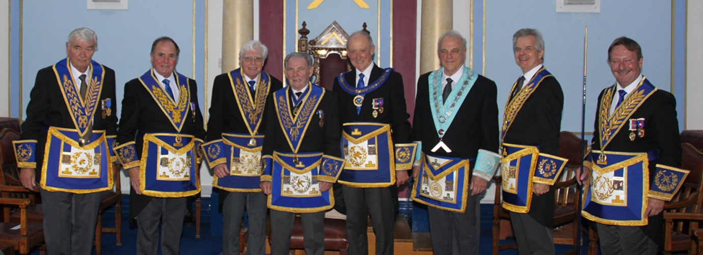 Pictured centre: David McCormick and Barry Jameson, flanked by grand and Provincial grand officers.
