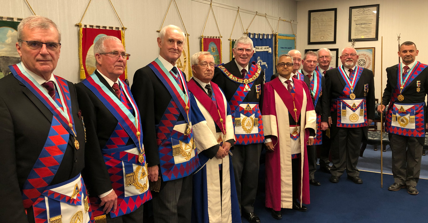 Tony surrounded by grand and acting Provincial grand officers at Corinthian Chapter.