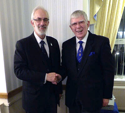 Gordon Ivett thanking Tony for his Provincial promotion.
