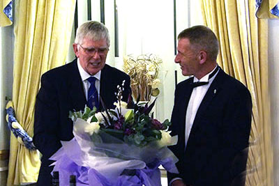 Tony receives a bouquet of flowers for his wife Maureen. Tony receives a bouquet of flowers for his wife Maureen.