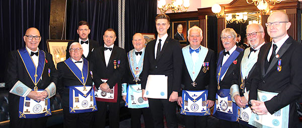 Matthew (centre) with the brethren of Croxteth United Services Lodge and Adelphi Lodge who partook in the ceremony.