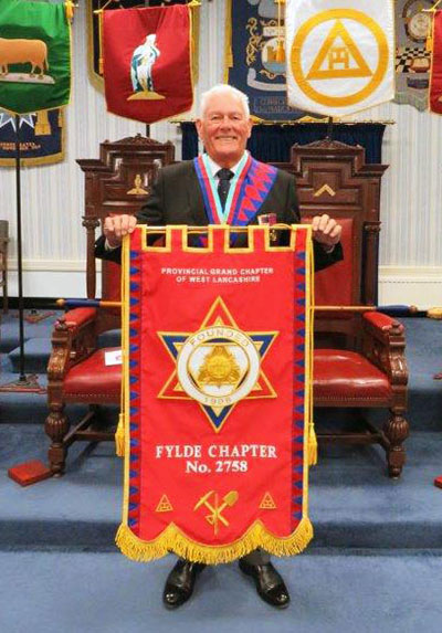 Trever Hunt proudly bearing Fylde Chapter’s banner