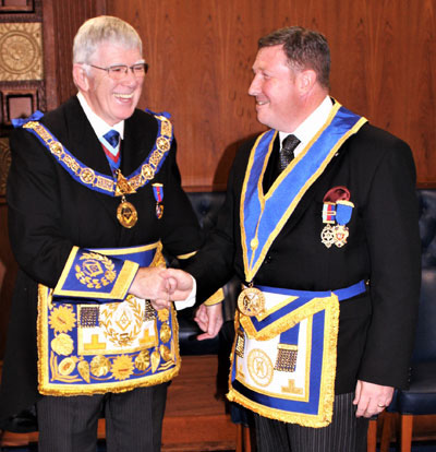 Tony Harrison (left) with ProvGDC for Guernsey and Alderney, Simon Hamon, a relative of Hand and Heart Founder Stanley Whitfield. Tony Harrison (left) with ProvGDC for Guernsey and Alderney, Simon Hamon, a relative of Hand and Heart Founder Stanley Whitfield.