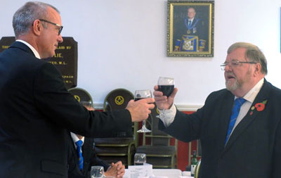 Harry Waggett (right) during the song to the master, exchanges greetings with Nigel Walker. Harry Waggett (right) during the song to the master, exchanges greetings with Nigel Walker.