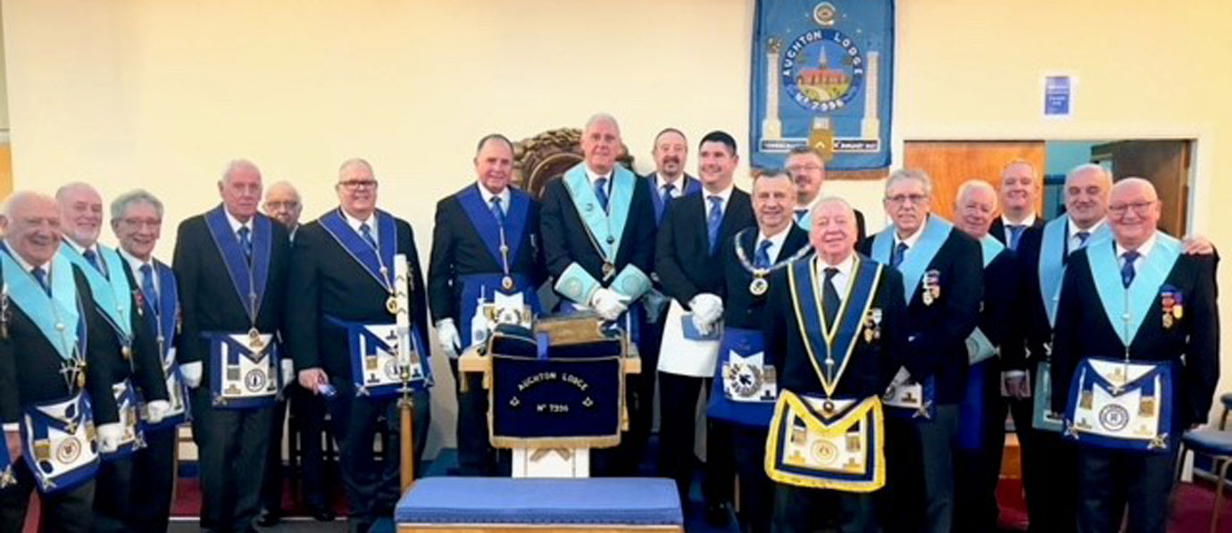 Andrew with members of the lodge and guests after his initiation.
