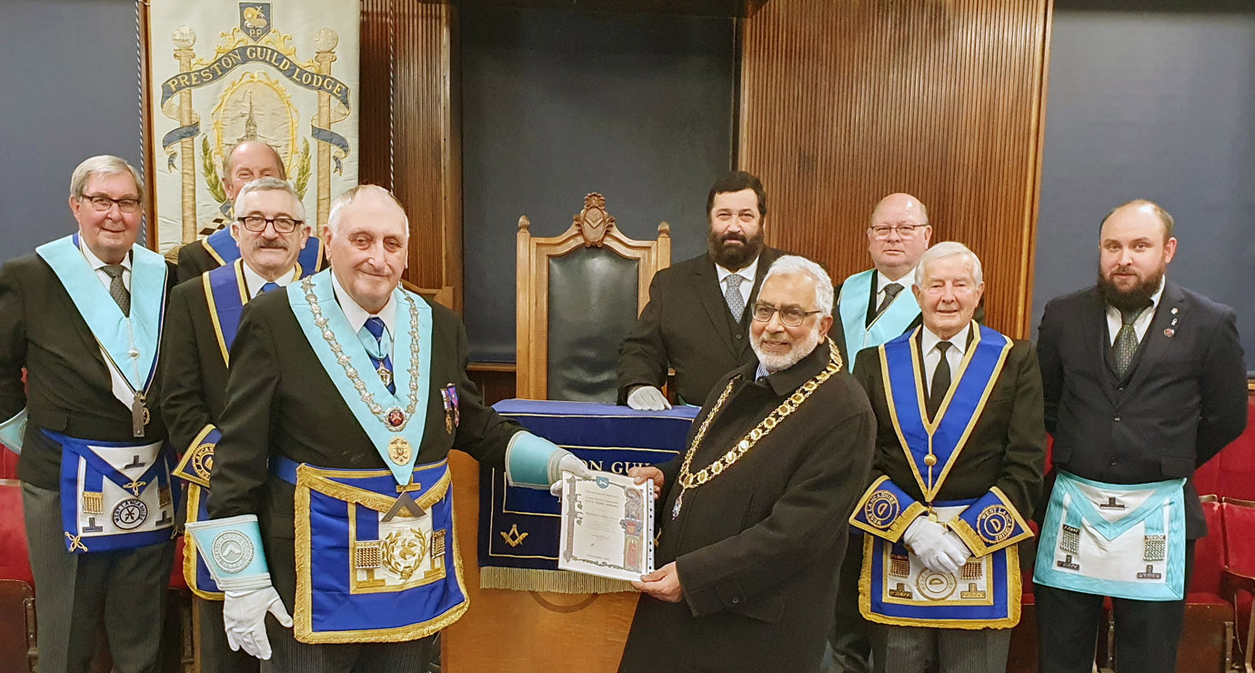 WM Ian Greenwood receives the certificate from Councillor Javed Iqbal. WM Ian Greenwood receives the certificate from Councillor Javed Iqbal.