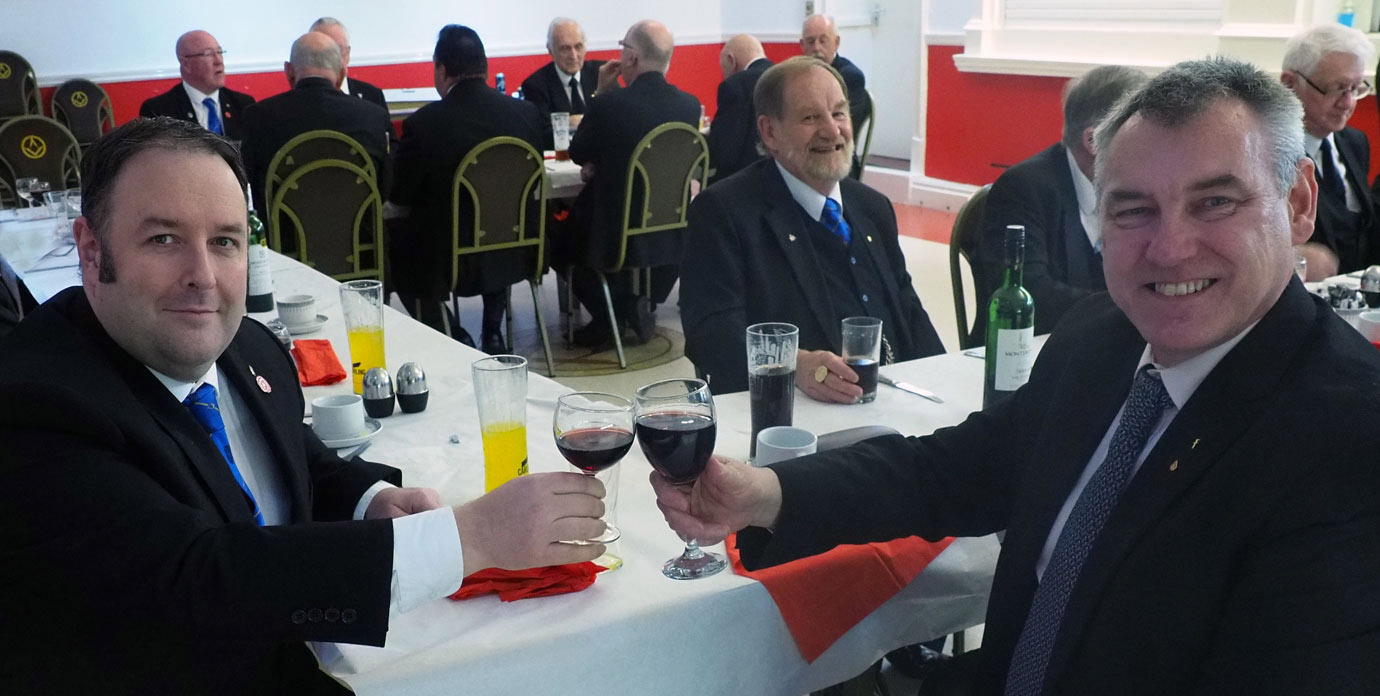 Ben Gorry (left) taking wine with Ken Greenwood of Tithebarn Lodge, with Bill Roscoe in the back ground.