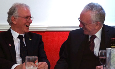 Bill McLoughlin (left) and Kevin Byrne share an amusing story at the dinner table. Bill McLoughlin (left) and Kevin Byrne share an amusing story at the dinner table.