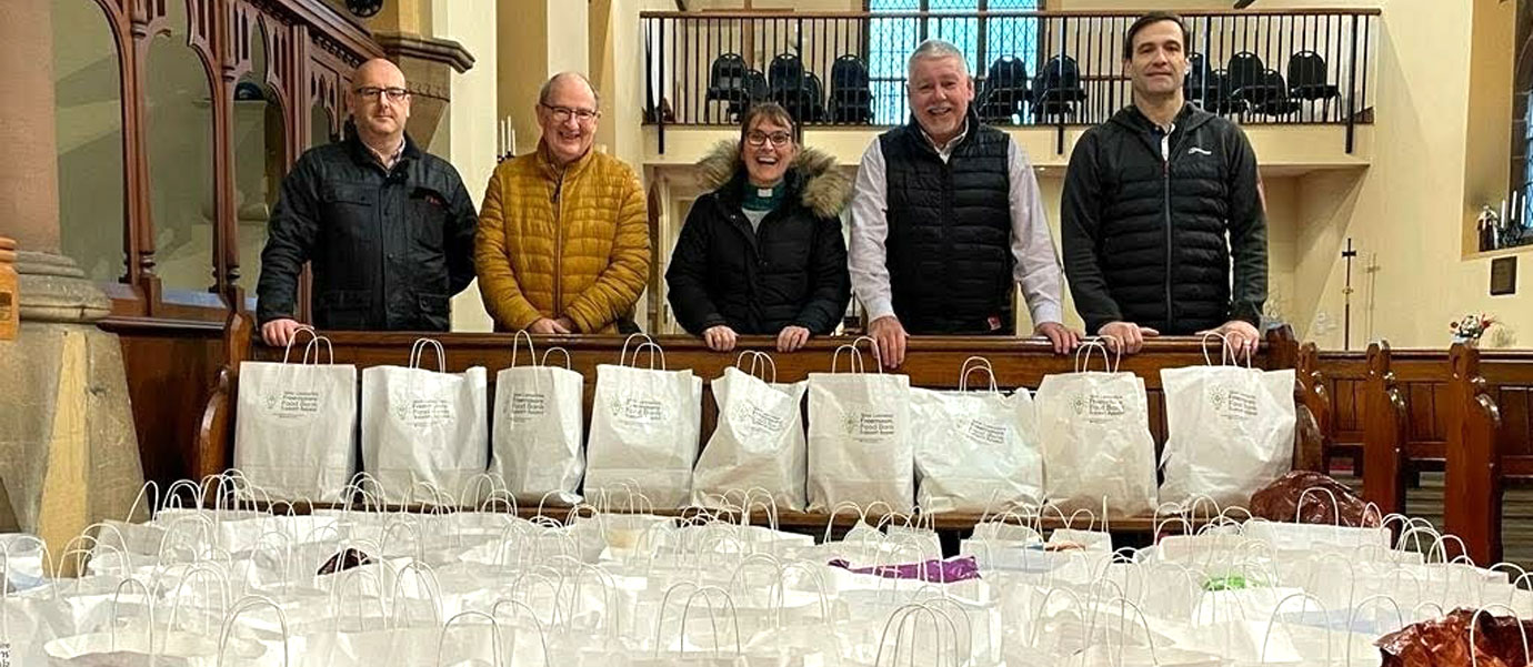 Got the parcels to the church on time. Pictured from left to right, are: Ian Lynch, John Gibbon, Rev Linda Riley-Dawkin, Bob Williams and Chris Farley. 