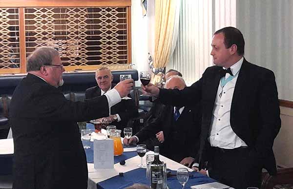 Harry Waggett toasts Tom during the master’s song. Harry Waggett toasts Tom during the master’s song.
