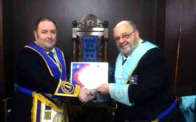 Ben Gorry (left) presented Peter Draper with the Masonic Charitable Foundation 2021 Festival Vice Patron certificate