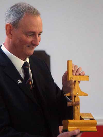 Alan Mitchell with his memento which had been made by Clive Gitsham’s wife. Alan Mitchell with his memento which had been made by Clive Gitsham’s wife.