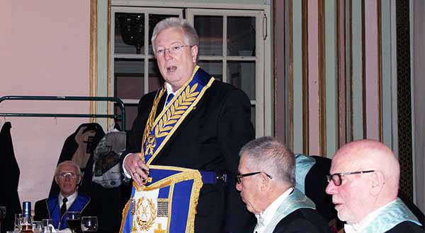 John Murphy congratulates James and the brethren of Harmonic Lodge.