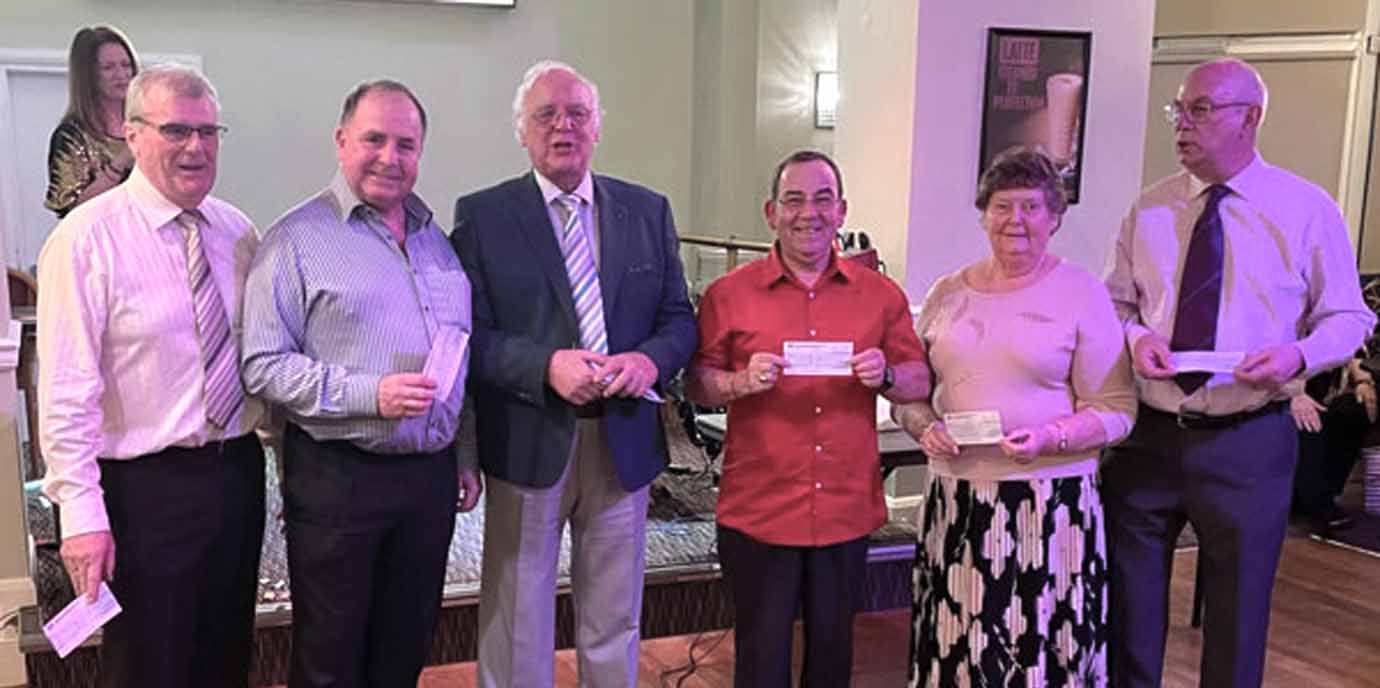 Presentation of cheques from left to right, are: John Selley, Graham Chambers, David Ogden, David Edmondson, Pamela Pearson and Dave Whitmore.