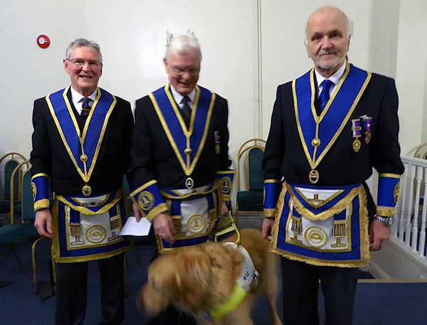 Pictured from left to right, are: John Donnelly, Phil Marshal with Harvey and Dave Moore.