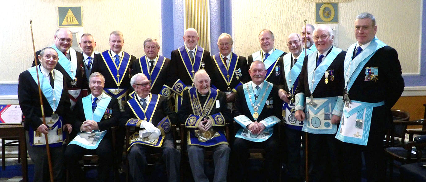 Reverend Canon Geoffrey Moore (centre) with his fellow members of Brotherhood Lodge