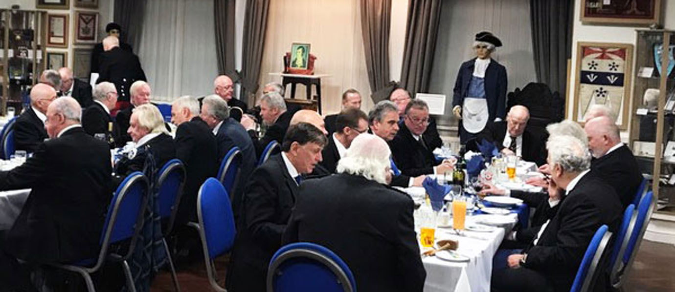 Brethren enjoying the Scottish fayre at the festive board in the museum dining room.