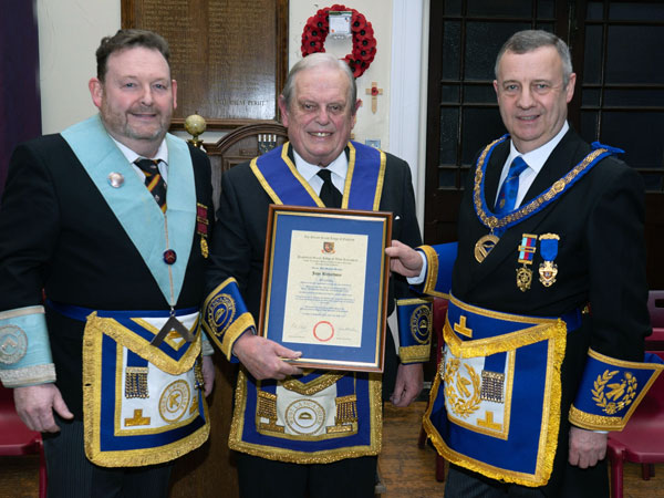 John proudly holds his diamond jubilee certificate, flanked by, left, David Topping (left) and Peter Lockett.