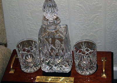 The whisky decanter and glasses presented in appreciation from the brethren of Grassendale Alliance Lodge.