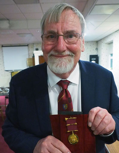 David Shaw proudly displays his past first principal jewel. David Shaw proudly displays his past first principal jewel.