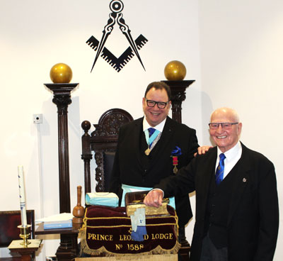 WM Shaun Brookfield (left) and DC Roy Eaton preparing for the installation.
