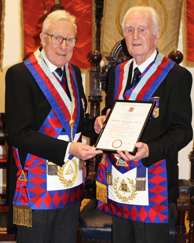 Peter (right) receiving his 60th anniversary certificate form Ian.