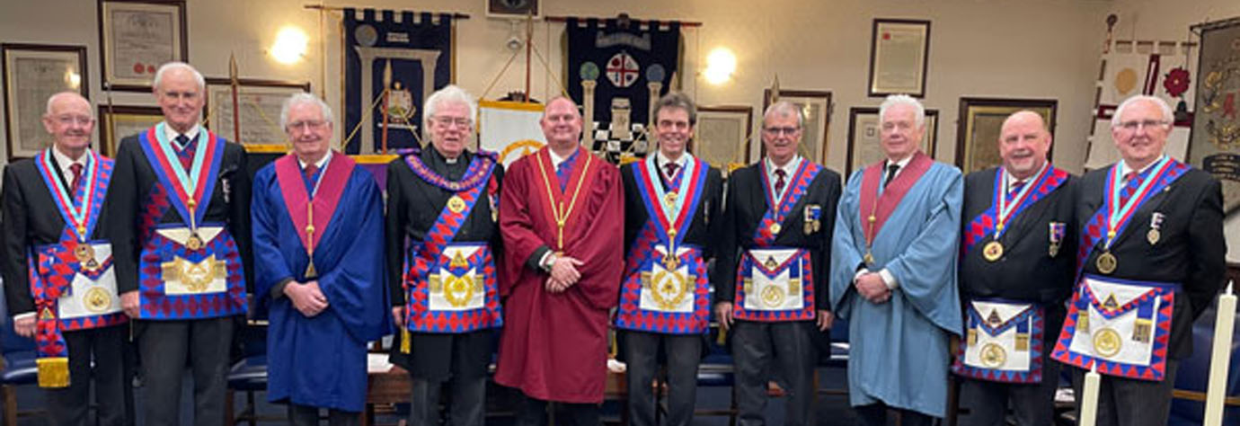 Godfrey Hirst (fourth left) with the three principals, grand officers and Provincial grand officers. Godfrey Hirst (fourth left) with the three principals, grand officers and Provincial grand officers.