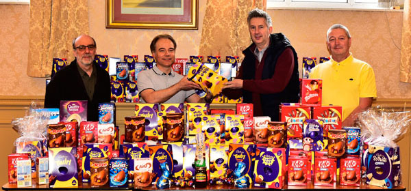 Pictured from left to right, are: David Case (Leigh Group Vice Chairman), Jonathan Heaton (Leigh Group Chairman), Warren Done (Atherton and Leigh Foodbank) and the Leigh Group Secretary.
