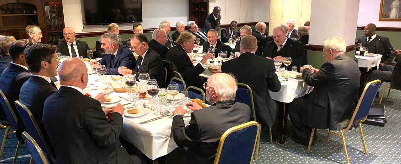 The brethren are pictured at the festive board. The brethren are pictured at the festive board.