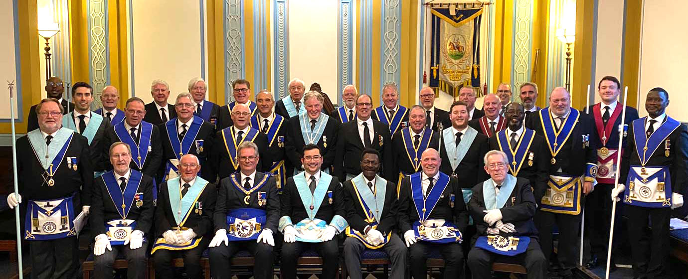 The members and guests are pictured after the anniversary meeting. The members and guests are pictured after the anniversary meeting.