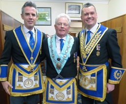 John Lee (left of centre) surrounded by other Baines Lodge brethren.
