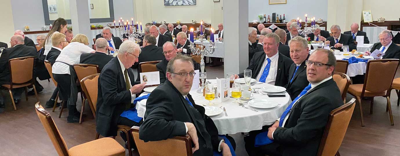 The brethren are pictured enjoying their meal in the dining room in Ormskirk Masonic Hall