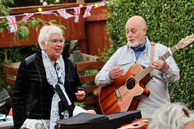 Claire and Ian Tupling entertain guests at Ormskirk and Bootle Garden Party.