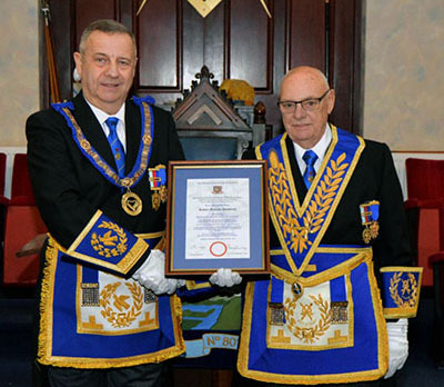 Peter Lockett (left) congratulating Malcolm Dewhurst. Peter Lockett (left) congratulating Malcolm Dewhurst.