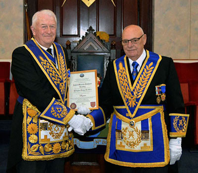 Norman Turner (left) congratulates Malcolm Dewhurst. 