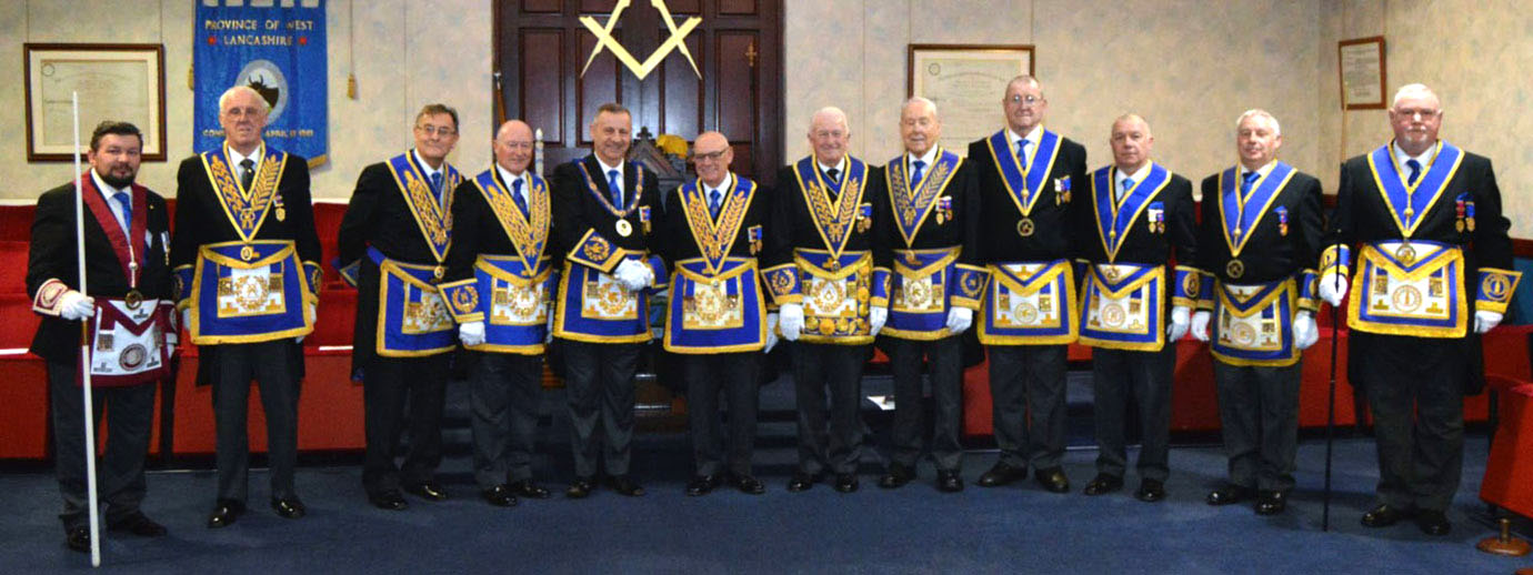 Malcolm with the grand and acting Provincial grand officers present for the celebration. Malcolm with the grand and acting Provincial grand officers present for the celebration.