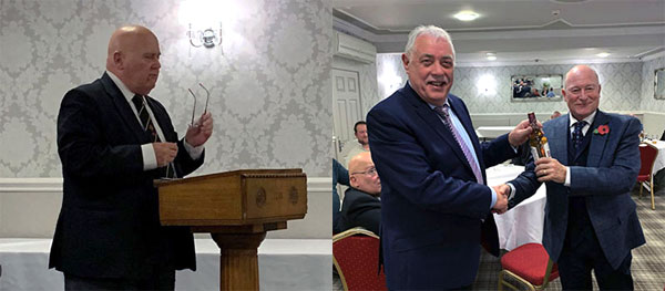 Pictured left: Ian Scott at the lectern. Pictured right: Derek Robinson (left) presents Peter Allen with his raffle prize Pictured left: Ian Scott at the lectern. Pictured right: Derek Robinson (left) presents Peter Allen with his raffle prize
