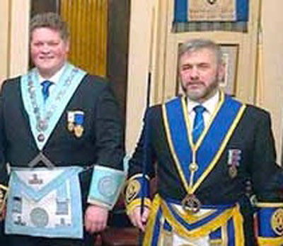 Installing master Dave Massam (left) with Robb Fitzsimmons. Installing master Dave Massam (left) with Robb Fitzsimmons.