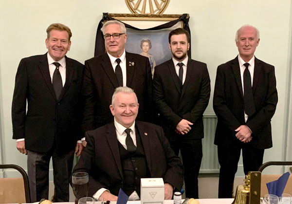 Pictured from left to right, are: Kevin Poynton, Derek Gaskell, Darren Crane (IPM), Dave Colquhoun (installing master) and seated the WM, Jack Poller.