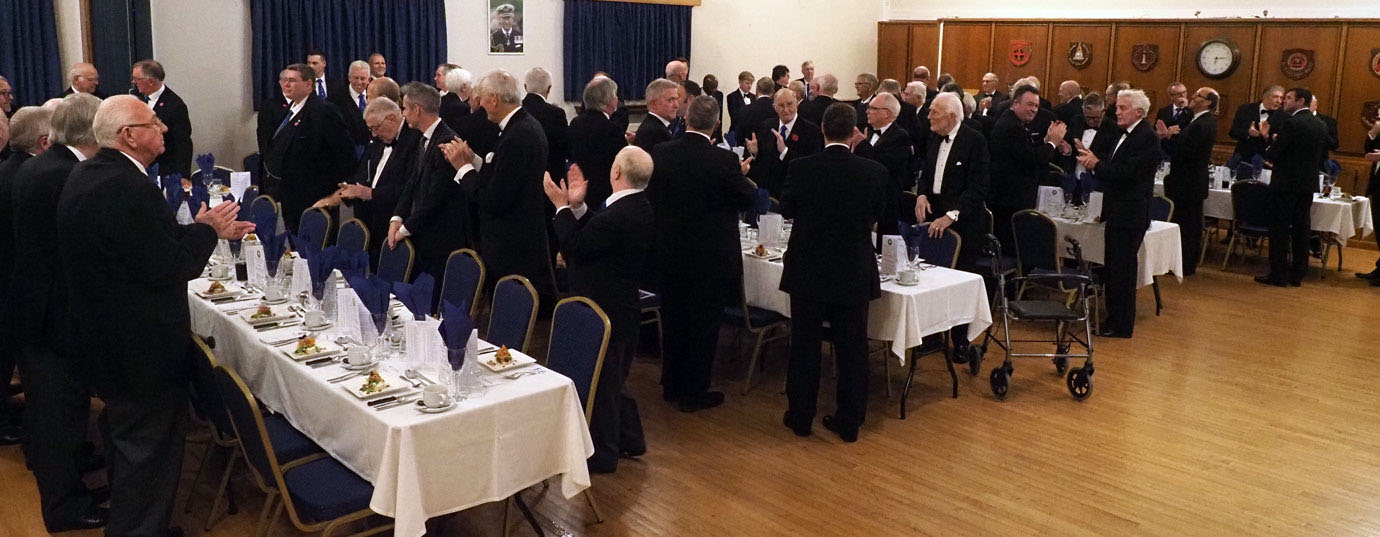 Brethren preparing to take their seats at the festive board. Brethren preparing to take their seats at the festive board.
