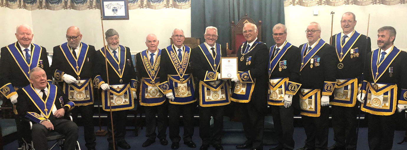 Jim Jackson (centre) with a selection of acting Provincial grand officers and grand officers.