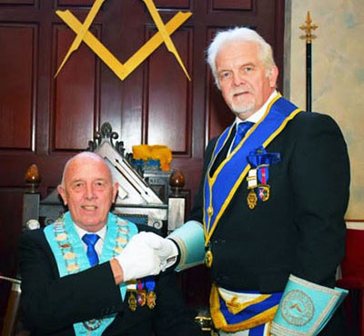 Derek Bond (left) is congratulated by David Hargreaves. Derek Bond (left) is congratulated by David Hargreaves.