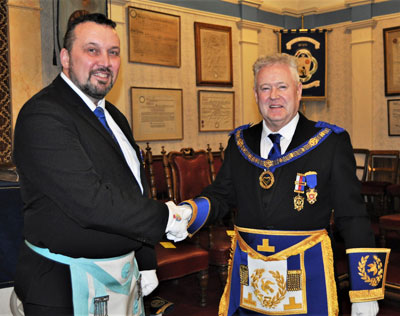 Keith (left) warmly welcomes Peter Schofield Keith (left) warmly welcomes Peter Schofield