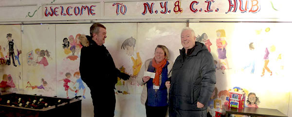 Pictured from left to right, are: Gary Devlin, Sharon Williams and John Murphy presenting the cheque.