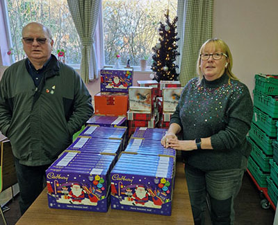 Cliff Jones and Steph Lees-Pinson with the Christmas Fayre. Cliff Jones and Steph Lees-Pinson with the Christmas Fayre.