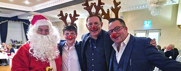 Santa with his trusted reindeers Alexander May, Mark Dunn and Simon Wright. Santa with his trusted reindeers Alexander May, Mark Dunn and Simon Wright.