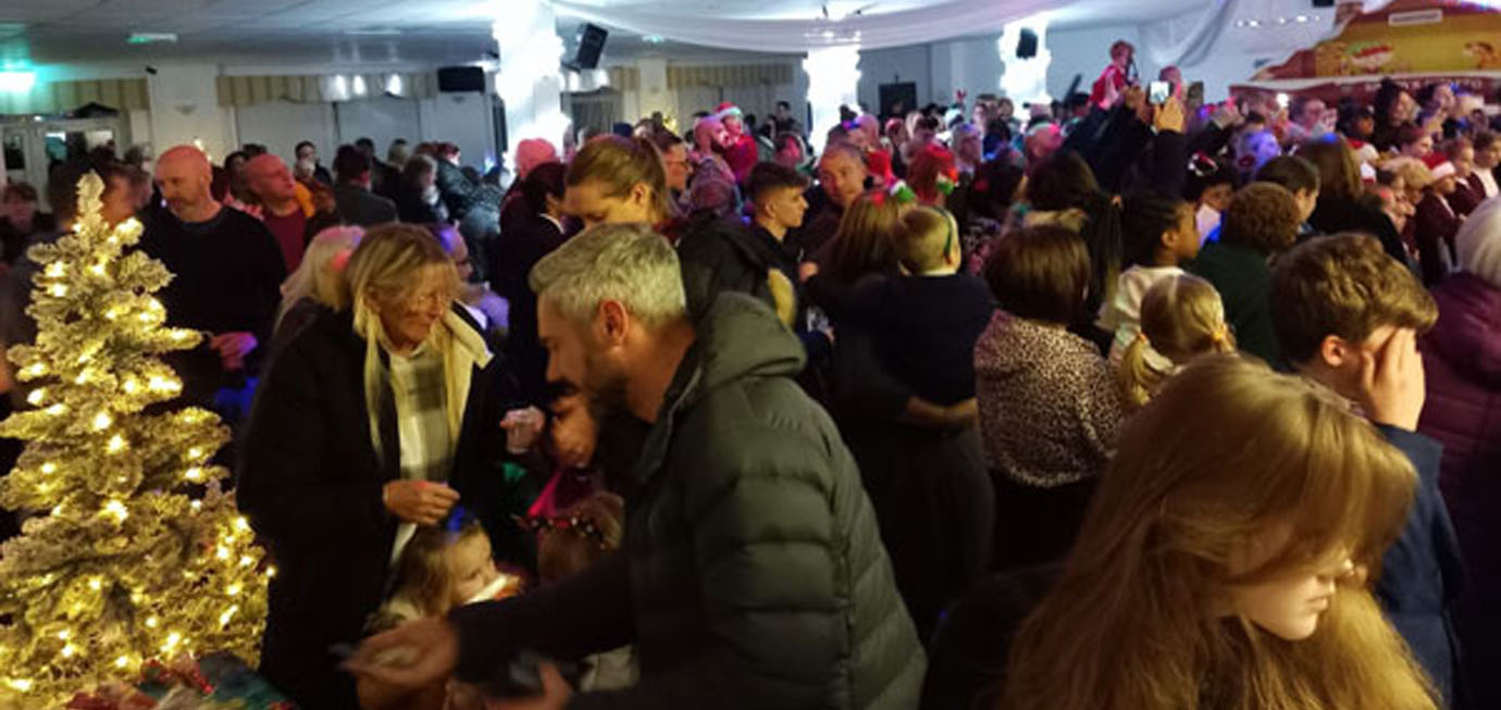 Massed ranks of children at Urmston Christmas Party.