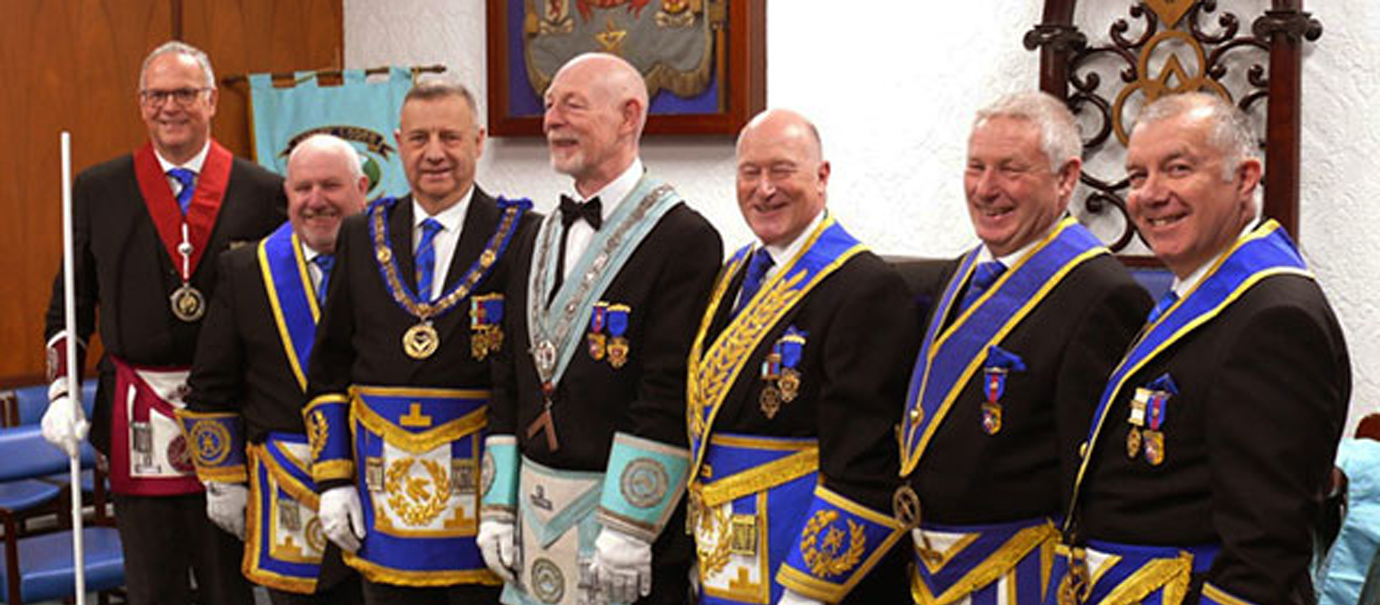 Andy (centre) with Peter Lockett (third left), Peter Allen (third right), Mike Silver (right) and acting Provincial grand officers.