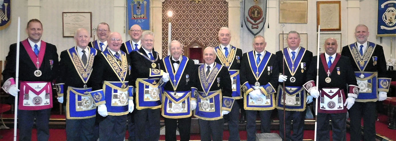 Assembled are the grand officers, acting Provincial grand officers and the Furness and South Lakeland Group Officers ready to celebrate Les’s anniversary.