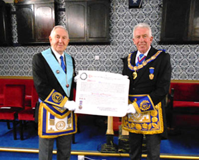 Ken Bradley (left) and Mark Matthews with the certificate.